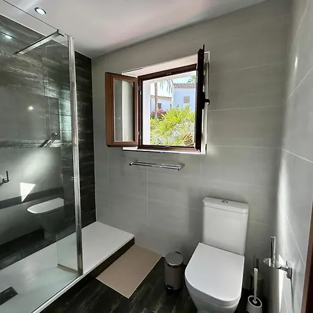 House In Surrounded By Golf Courses